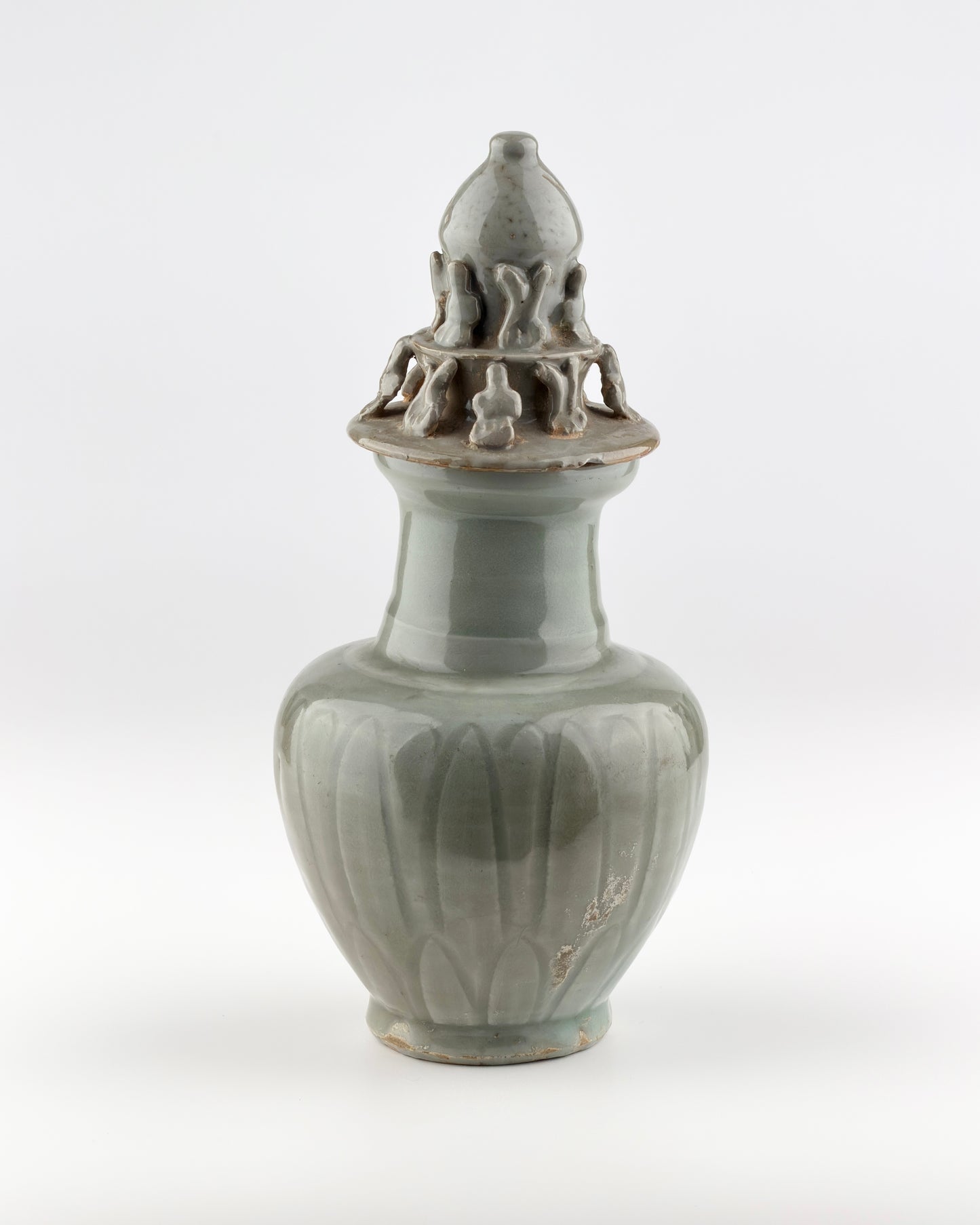 Carved 'Longquan' Celadon-glazed Funerary vase and cover, Song dynasty