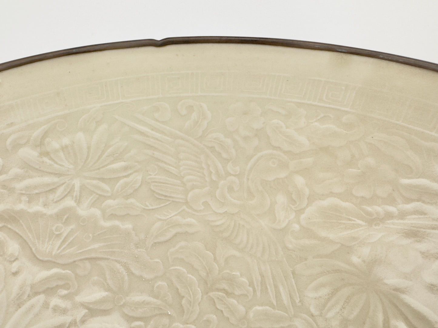 A RARE MOULDED DINGYAO 'CRANES AND FISHES' BOWL, NORTHERN SONG - JIN DYNASTY