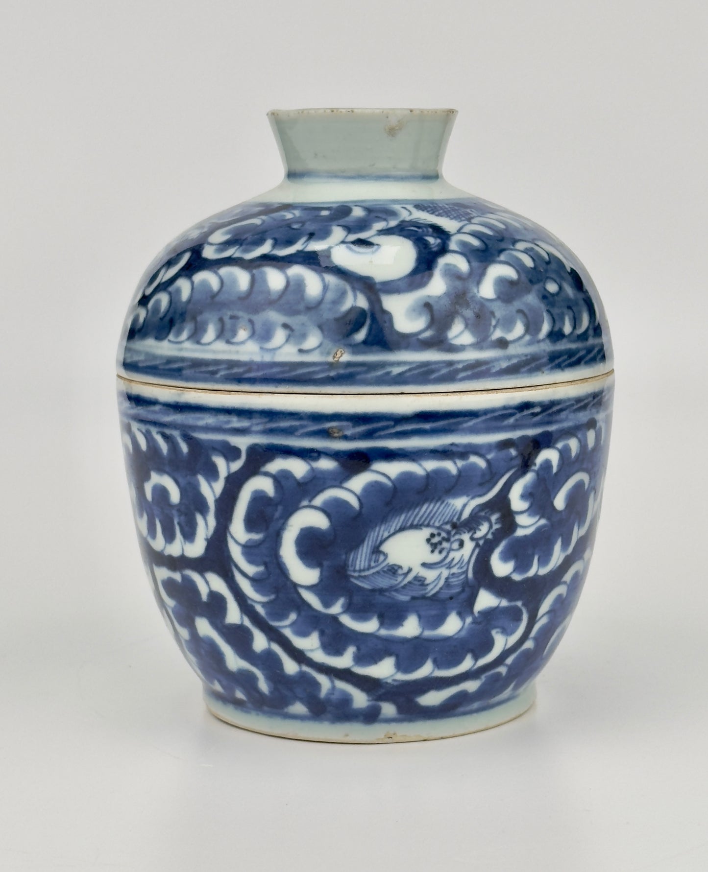 Blue and white Porcelain Covered Jar with Dragons amidst Clouds, Qing Period