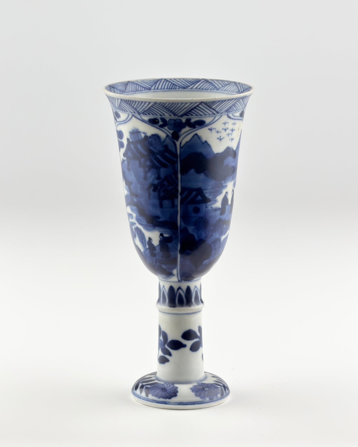 BLUE AND WHITE STEMCUP, QING DYNASTY, KANGXI ERA, CIRCA 1690