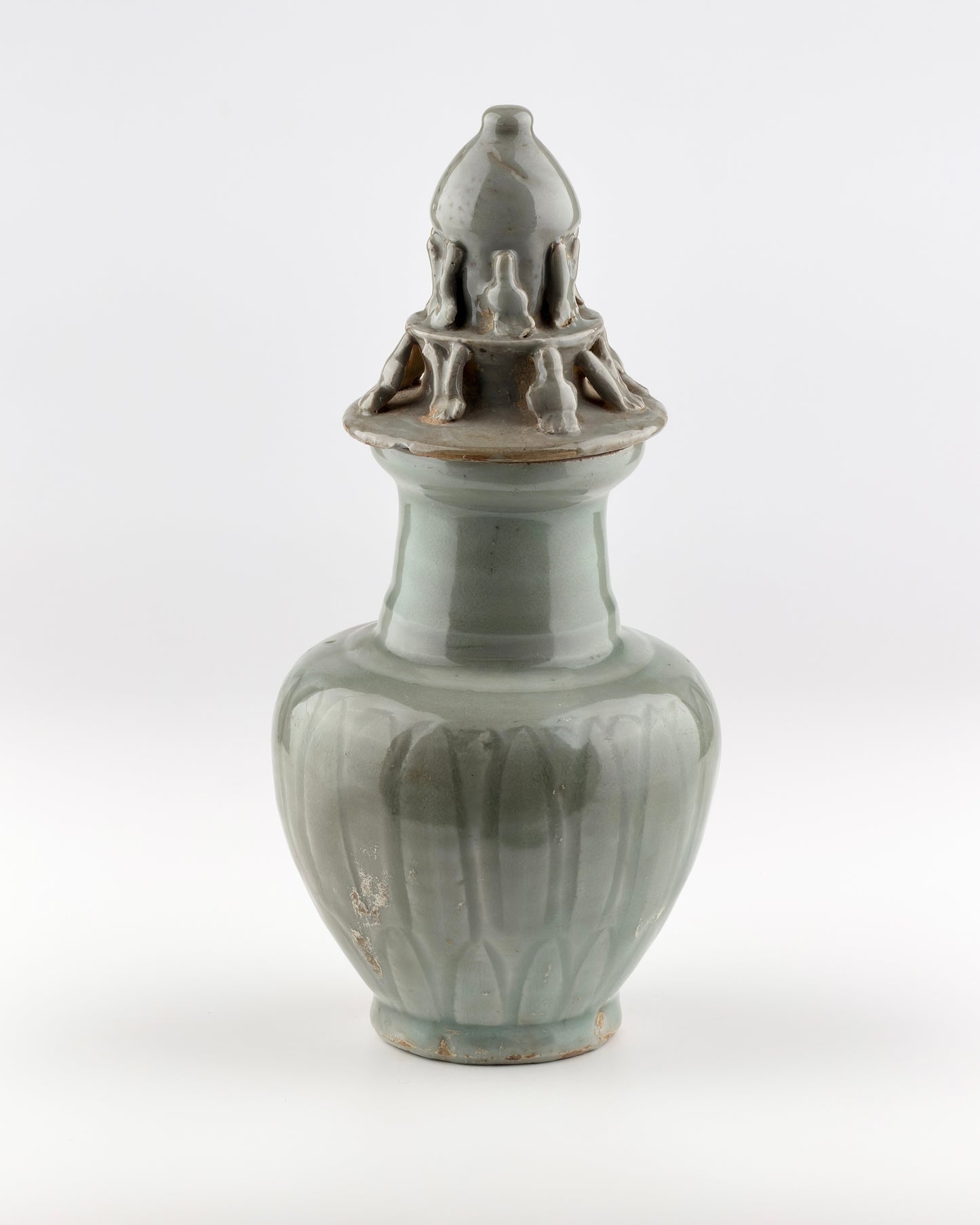 Carved 'Longquan' Celadon-glazed Funerary vase and cover, Song dynasty