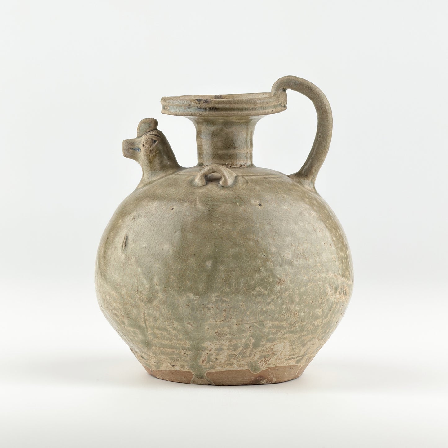 A RARE YUE CELADON CHICKEN-HEAD EWER, JIN-SOUTHERN DYNASTY