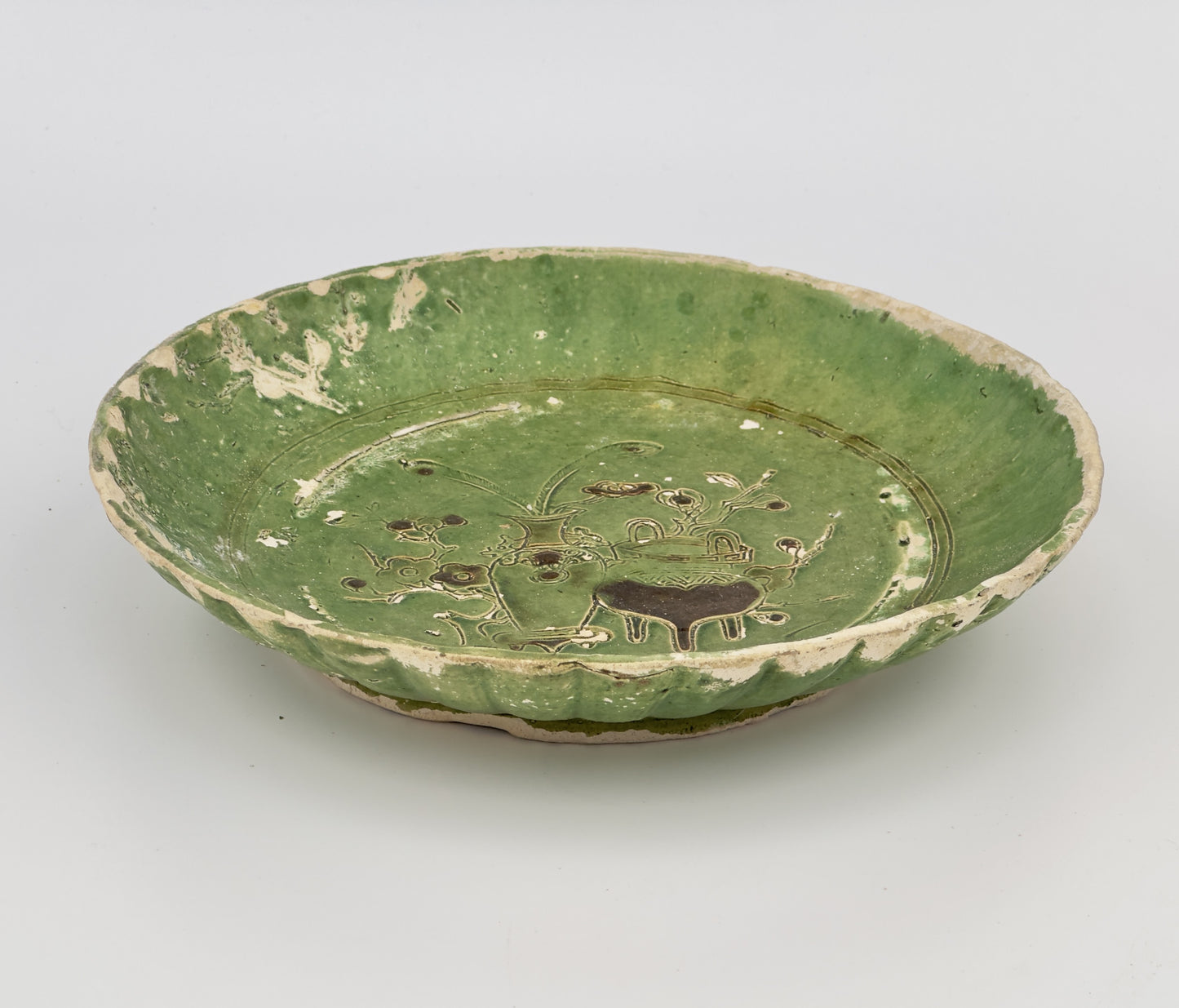 GREEN-GLAZED EARTHENWARE DISH CIRCA 1725, QING DYNASTY, YONGZHENG REIGN