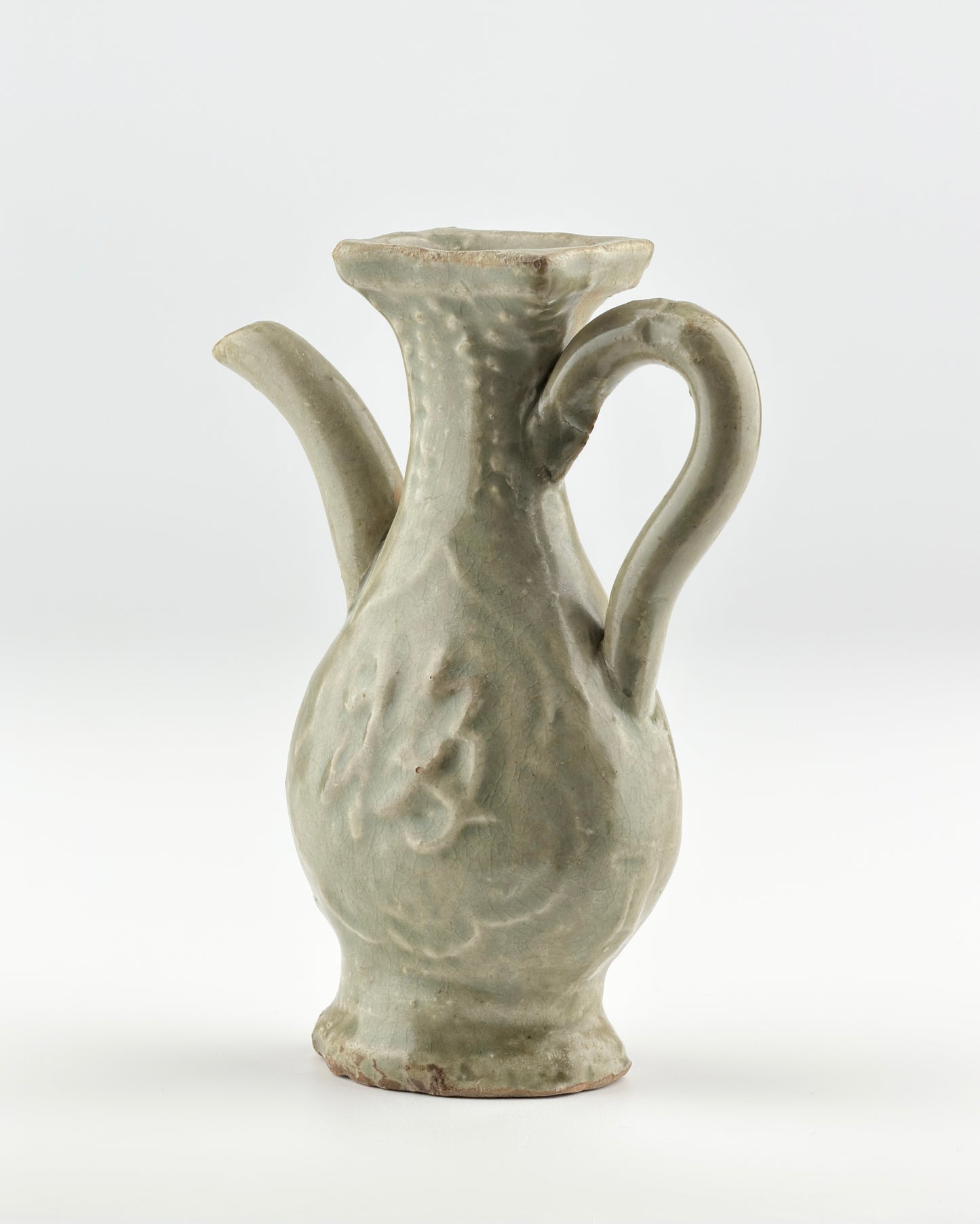 MOLDED LONGQUAN CELADON 'FU SHOU' EWER, MING DYNASTY