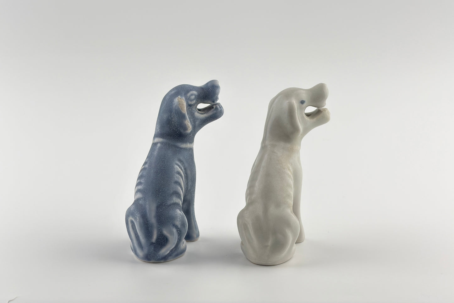 Two Miniature White Figure of Seated Hounds, Circa 1725, Qing Dynasty, Yongzheng reign