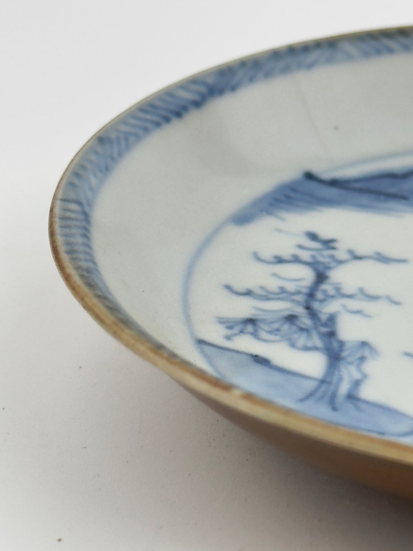 PASSING BOAT AND FIGURE PATTERN BLUE AND WHITE SAUCER, CIRCA 1725, QING DYNASTY, YONGZHENG ERA