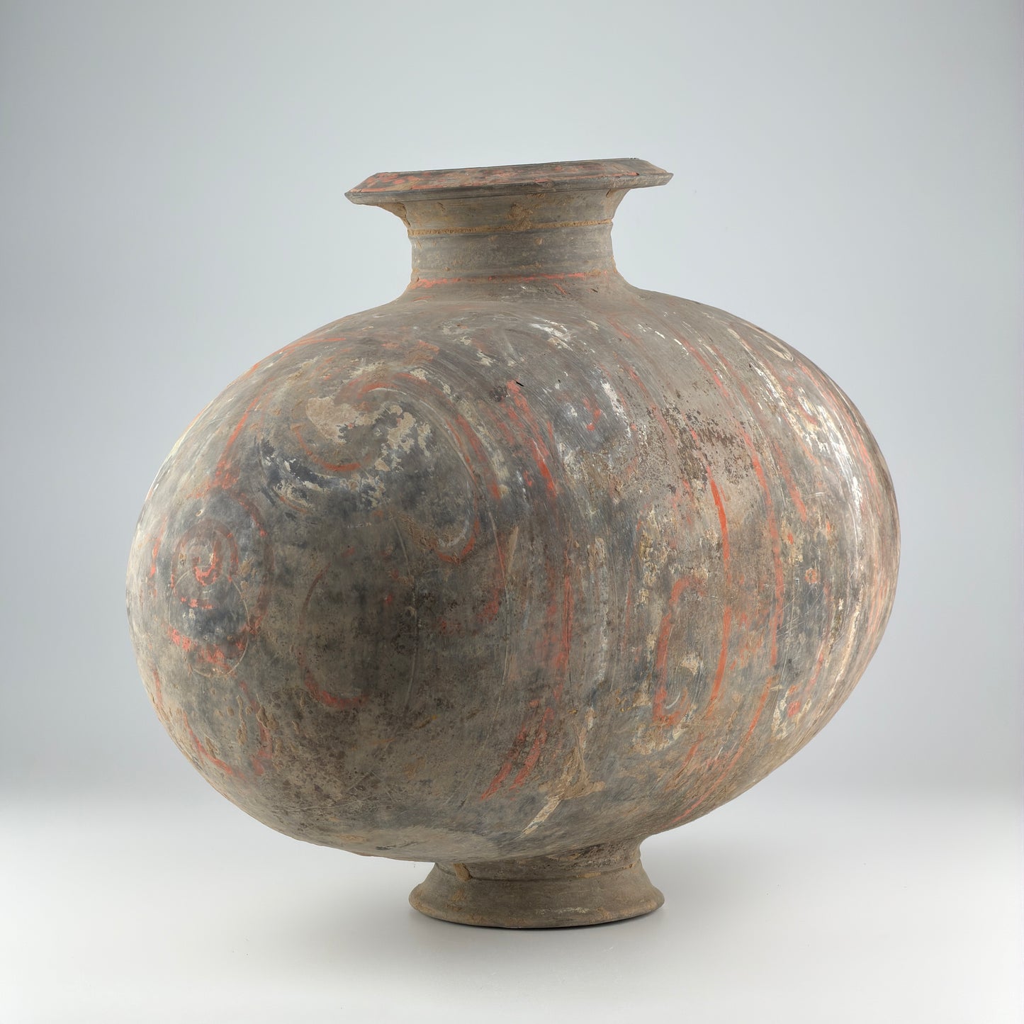 COCOON-SHAPED JAR WITH CLOUD-SCROLL DESIGN, HAN DYNASTY