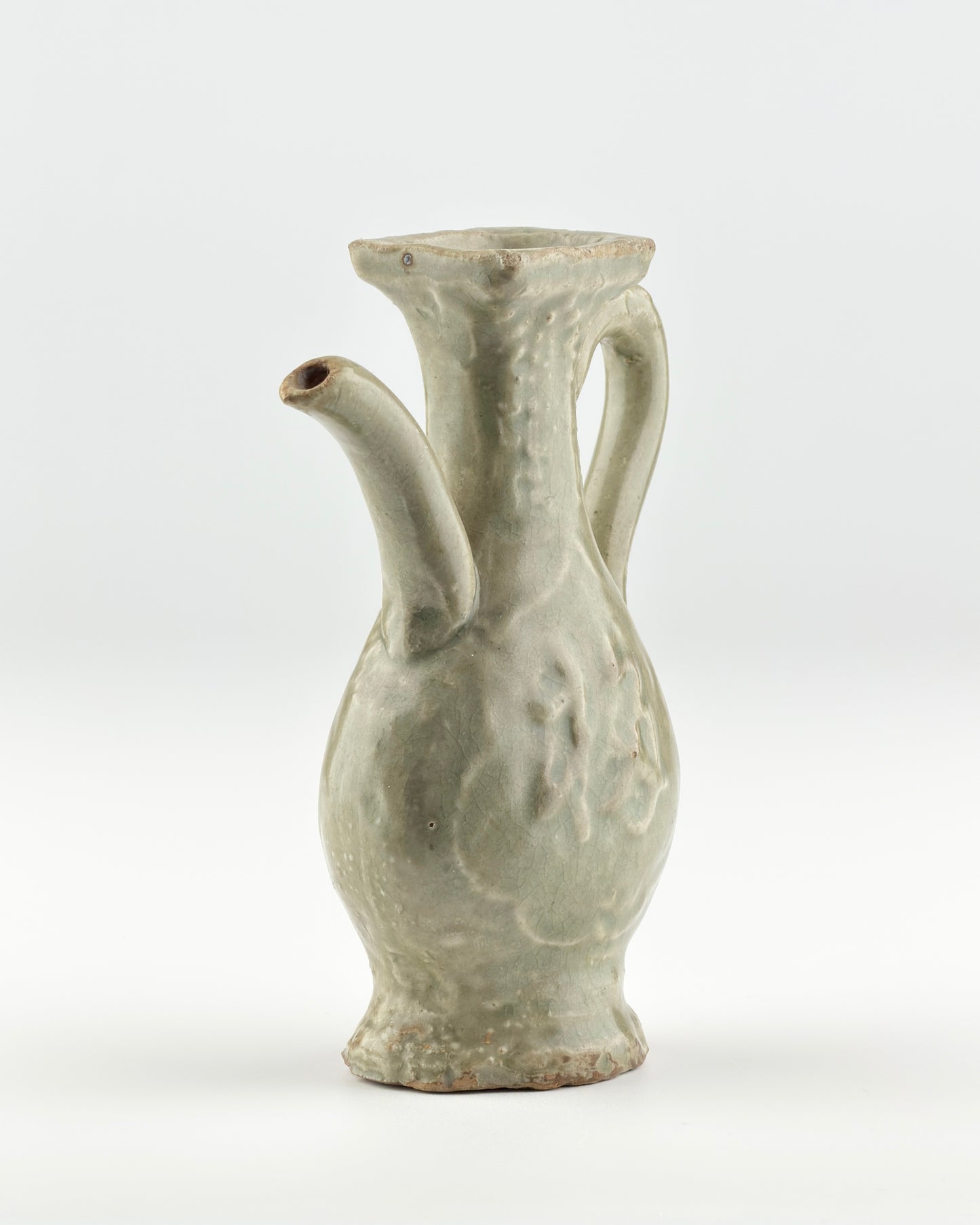 MOLDED LONGQUAN CELADON 'FU SHOU' EWER, MING DYNASTY