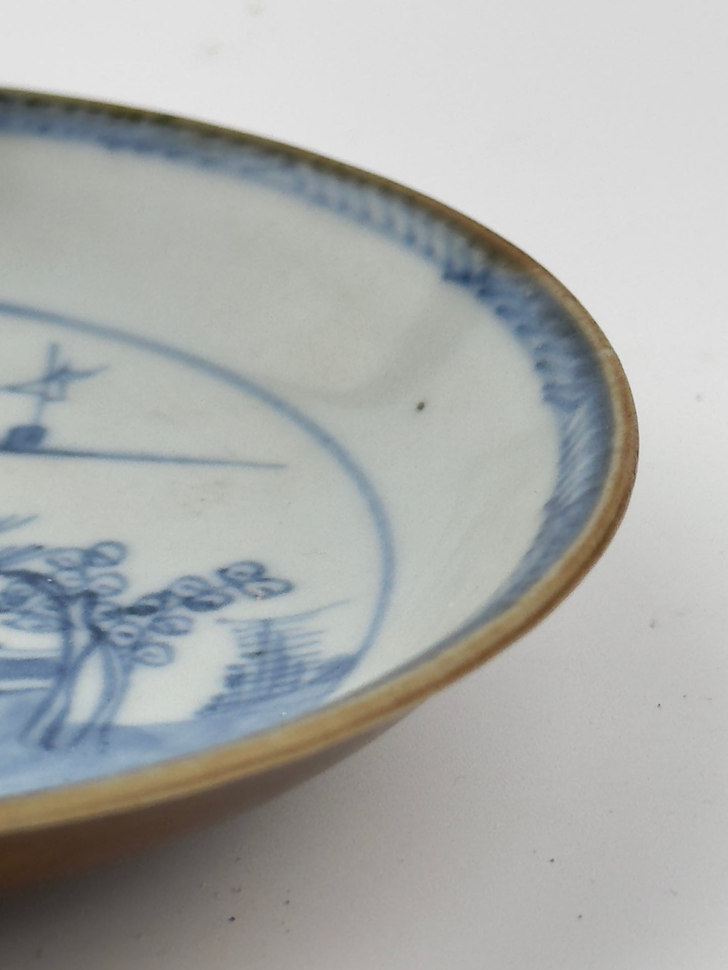 PASSING BOAT AND FIGURE PATTERN BLUE AND WHITE SAUCER, CIRCA 1725, QING DYNASTY, YONGZHENG ERA