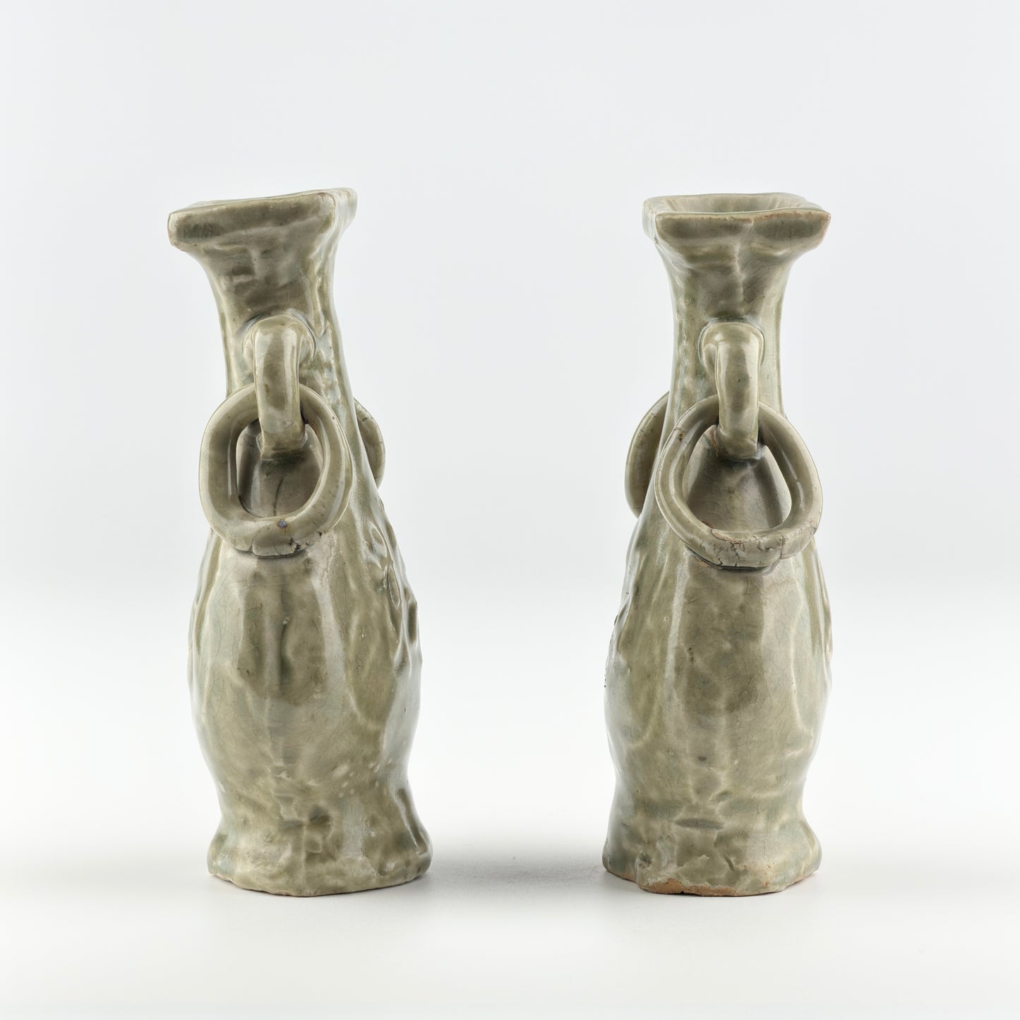 TWO MOLDED LONGQUAN CELADON 'FU SHOU' VASES, MING DYNASTY
