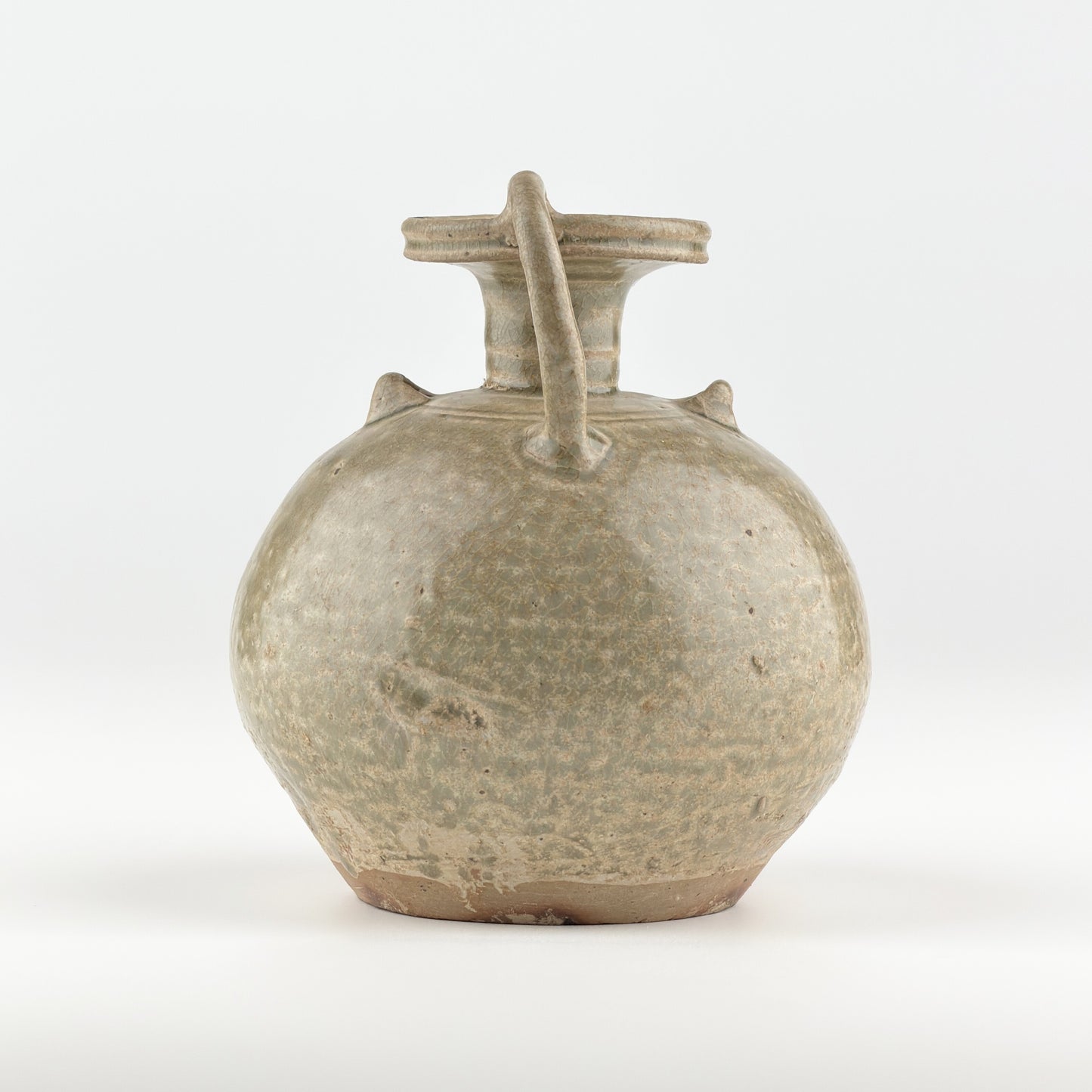 A RARE YUE CELADON CHICKEN-HEAD EWER, JIN-SOUTHERN DYNASTY