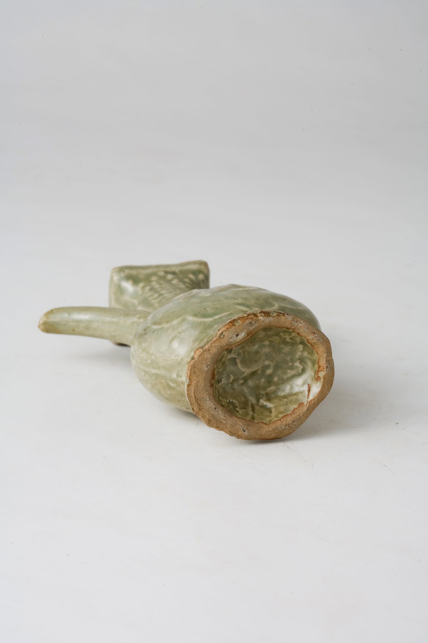 MOLDED LONGQUAN CELADON 'FU SHOU' EWER, MING DYNASTY