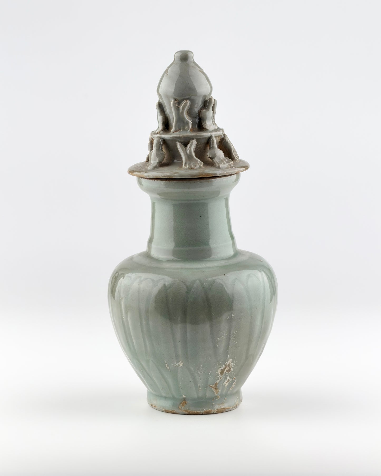 Carved 'Longquan' Celadon-glazed Funerary vase and cover, Song dynasty