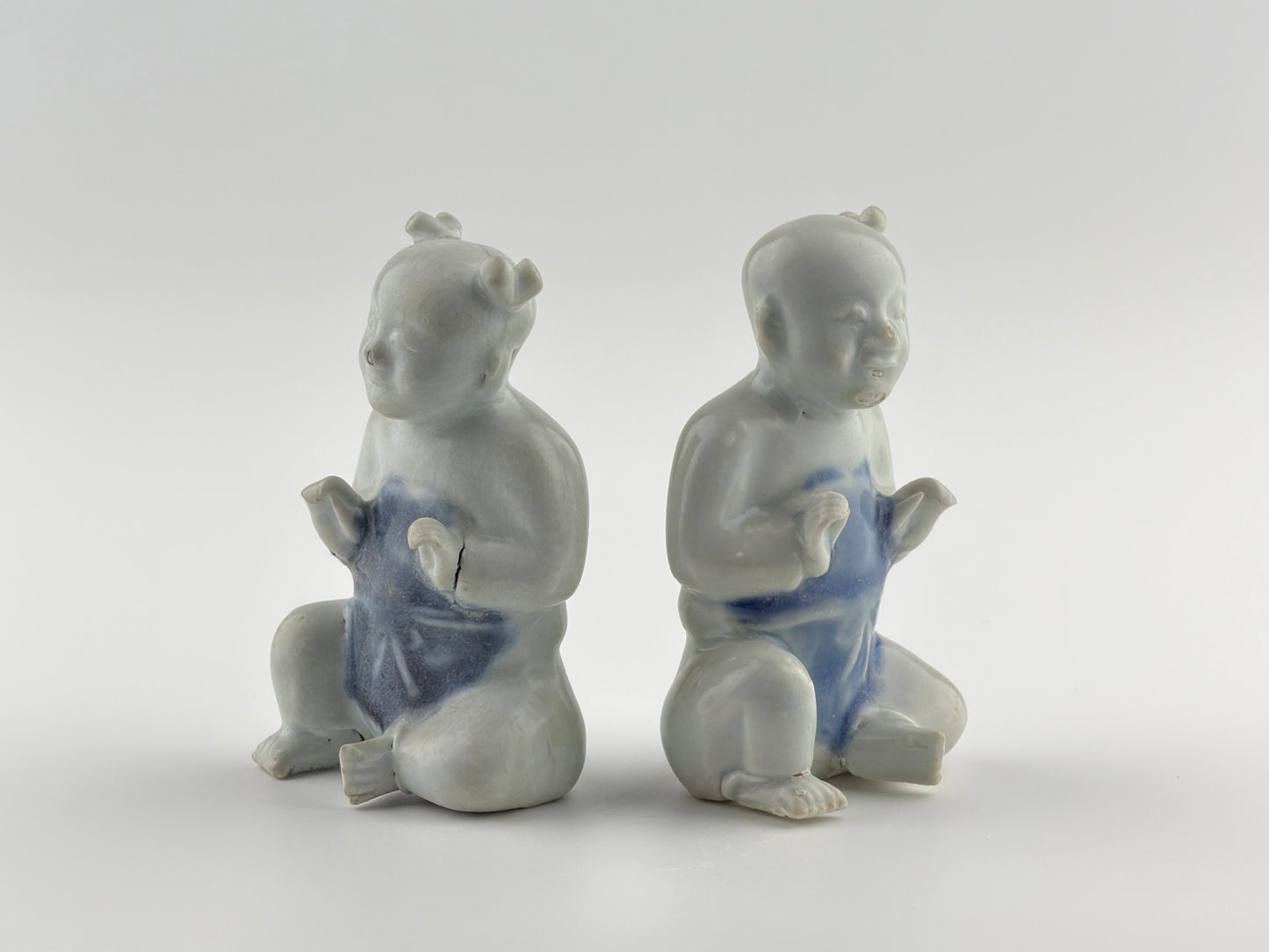 Two Miniature Figurine Of Seated Boys, Circa 1725, Qing Dynasty, Yongzheng Reign