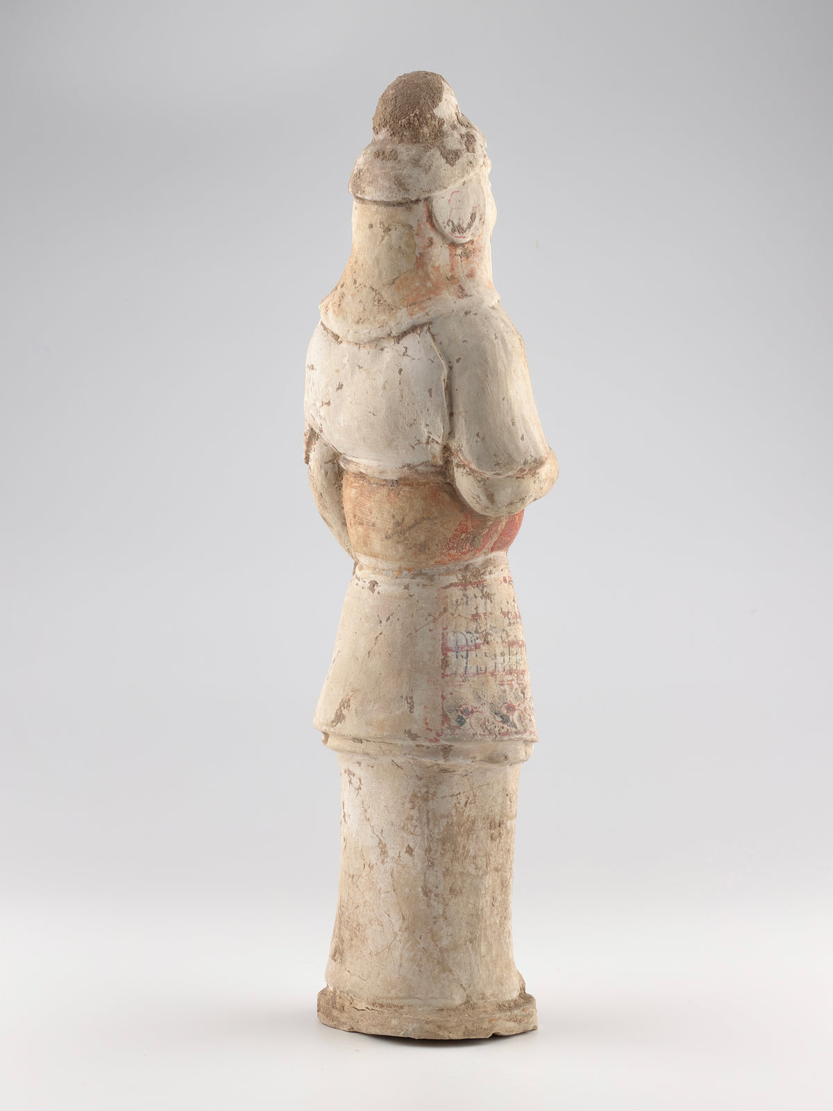 Sui-Tang Dynasty pottery warrior figure with raised arm, clenched fists, layered chest and shoulder armor, and original pigments.