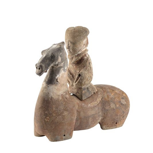 Han Dynasty pottery mounted soldier and horse figures in reddish-brown earthenware, featuring an unglazed finish and modular construction.