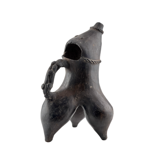 Neolithic black pottery tripod ewer with three rounded legs, sculptural face-shaped opening, slanted spout, and twisted band.