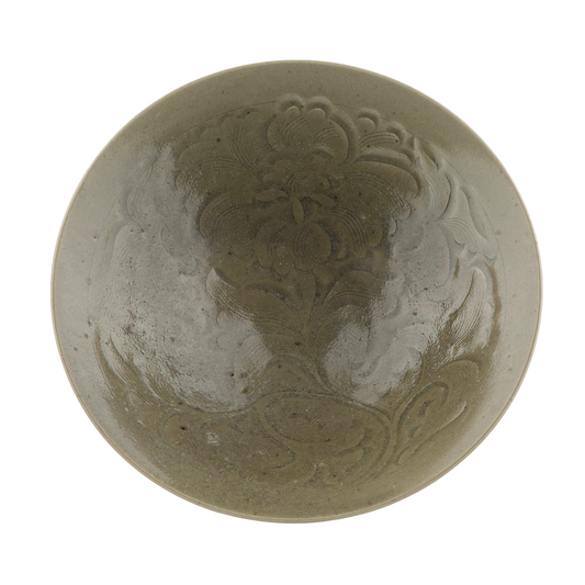 Song Dynasty Yaozhou celadon bowl with carved peony scroll, olive-grey glaze, flared sides, and vertical fluting.