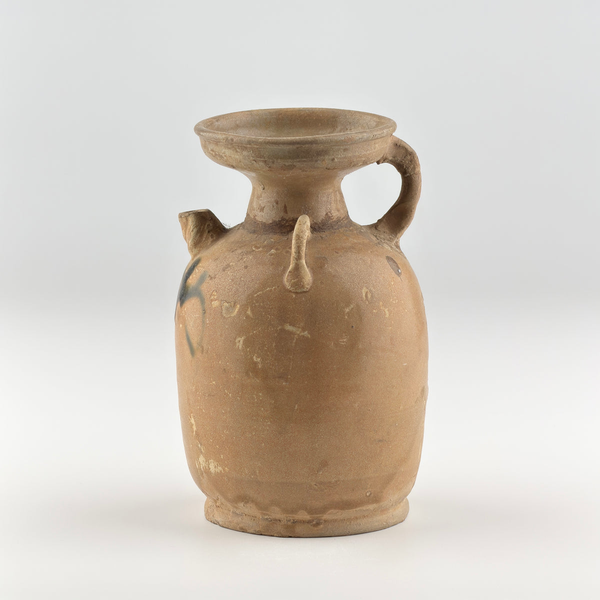 Tang Dynasty Changsha stoneware ewer with iron-brown splashes, loop handle, short spout, and pale buff glaze, 9th century Hunan.