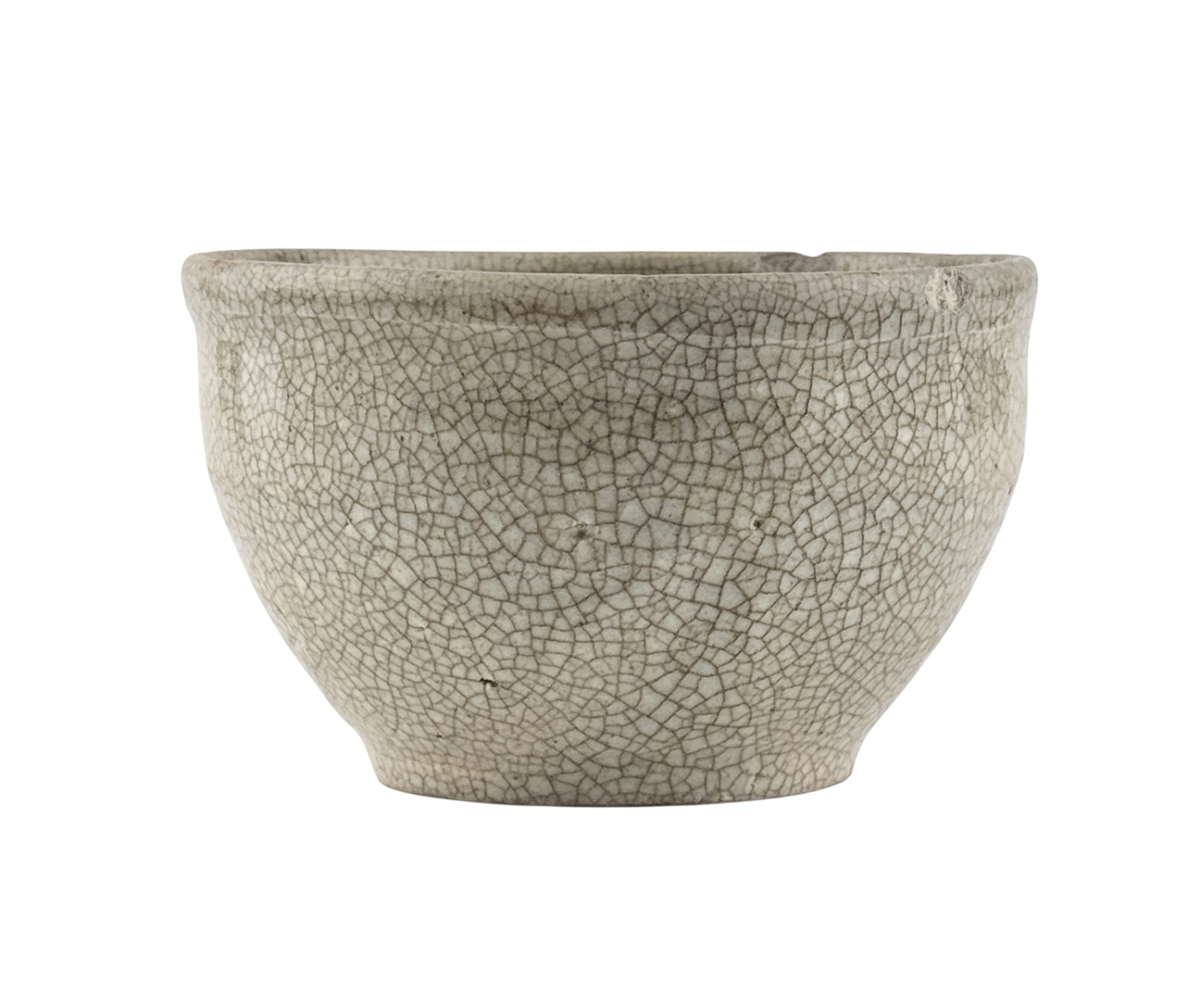 Chinese crackle-glazed ceramic bowl with rounded form, pale grey-yellow glaze, and brown crackle network, Qing or Song Dynasty.