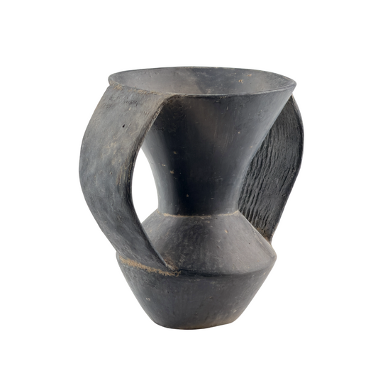 Ancient black-burnished pottery vessel with trumpet-shaped mouth, twin flat handles, and lustrous black finish.