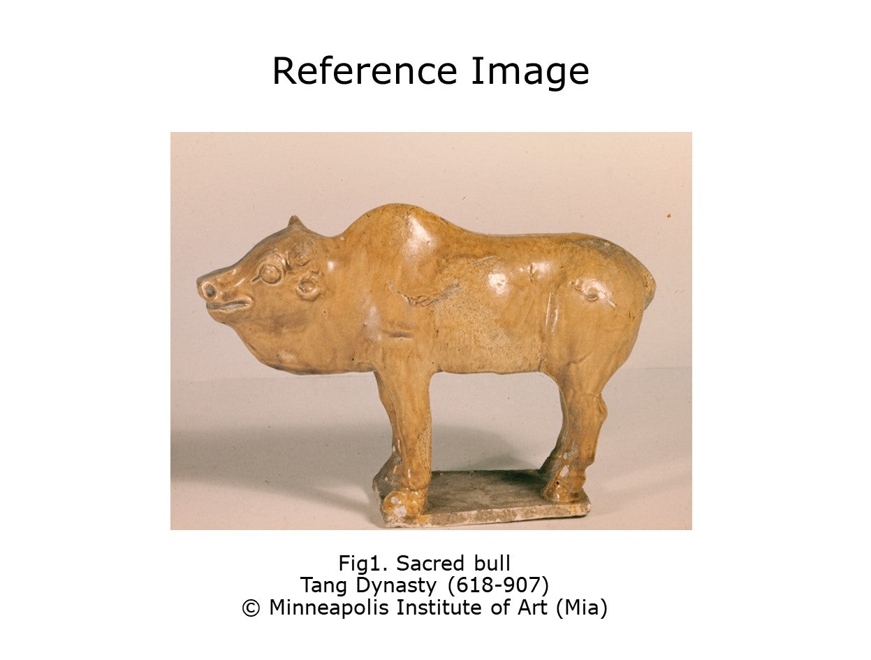 AMBER-GLAZED POTTERY FIGURE OF SACRED BULL, TANG-LIAO DYNASTY (7-12TH CENTURY)
