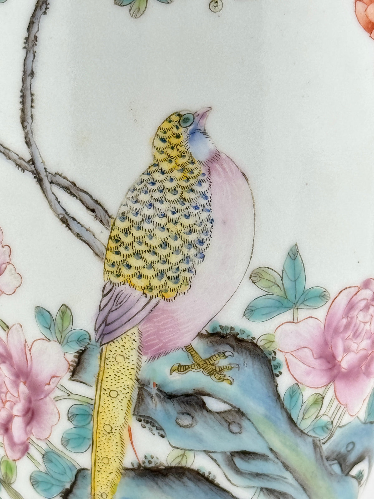 Famille rose porcelain vase, Late Qing-Republic period, with golden pheasant, peonies, butterflies, and iron-red beast-head handles.