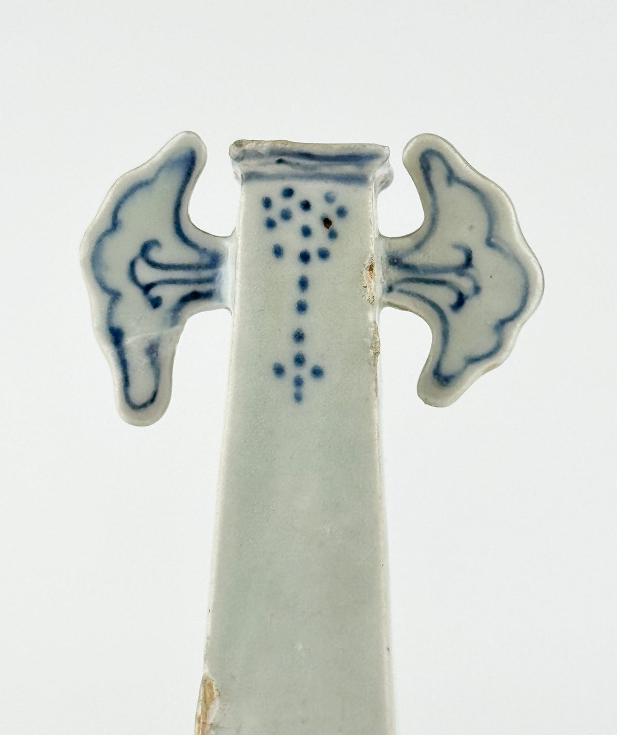 Ming-Qing blue and white porcelain four-sided vase with underglaze-blue floral scrolls and a softly glazed surface.