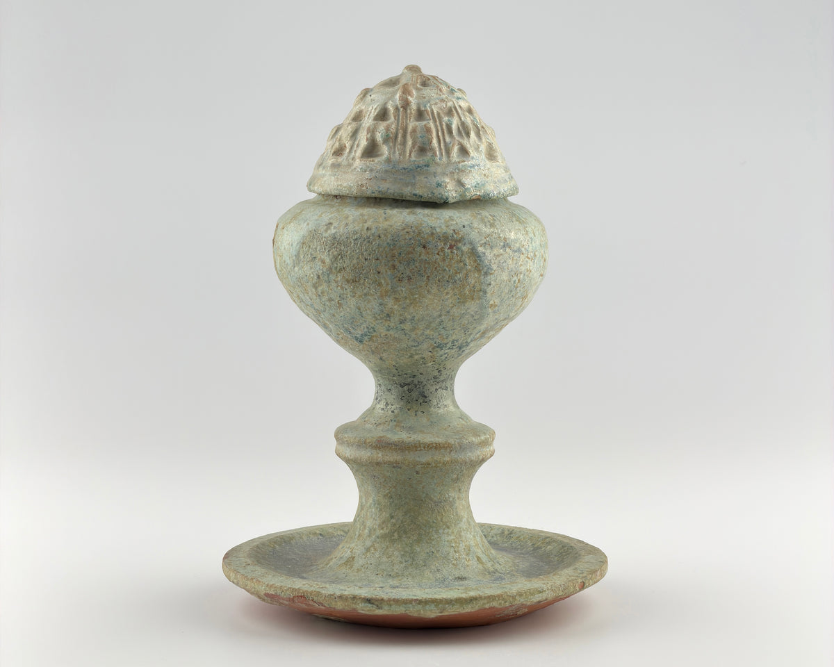 Han Dynasty green lead-glazed pottery Boshan censer with a mountain-shaped lid and ancient funerary design.