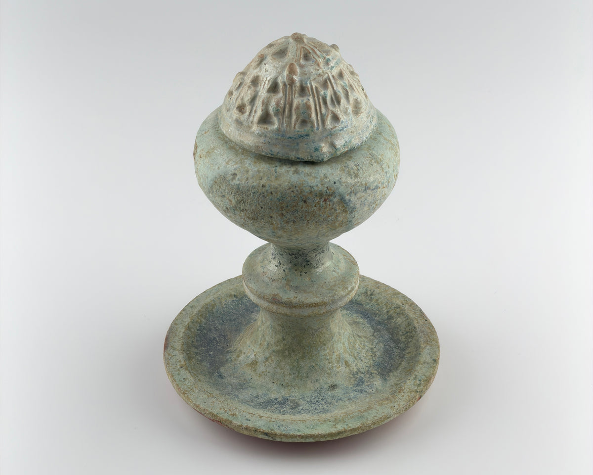 Han Dynasty green lead-glazed pottery Boshan censer with a mountain-shaped lid and ancient funerary design.