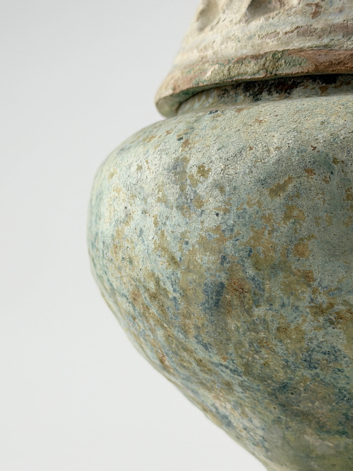 Han Dynasty green lead-glazed pottery Boshan censer with a mountain-shaped lid and ancient funerary design.