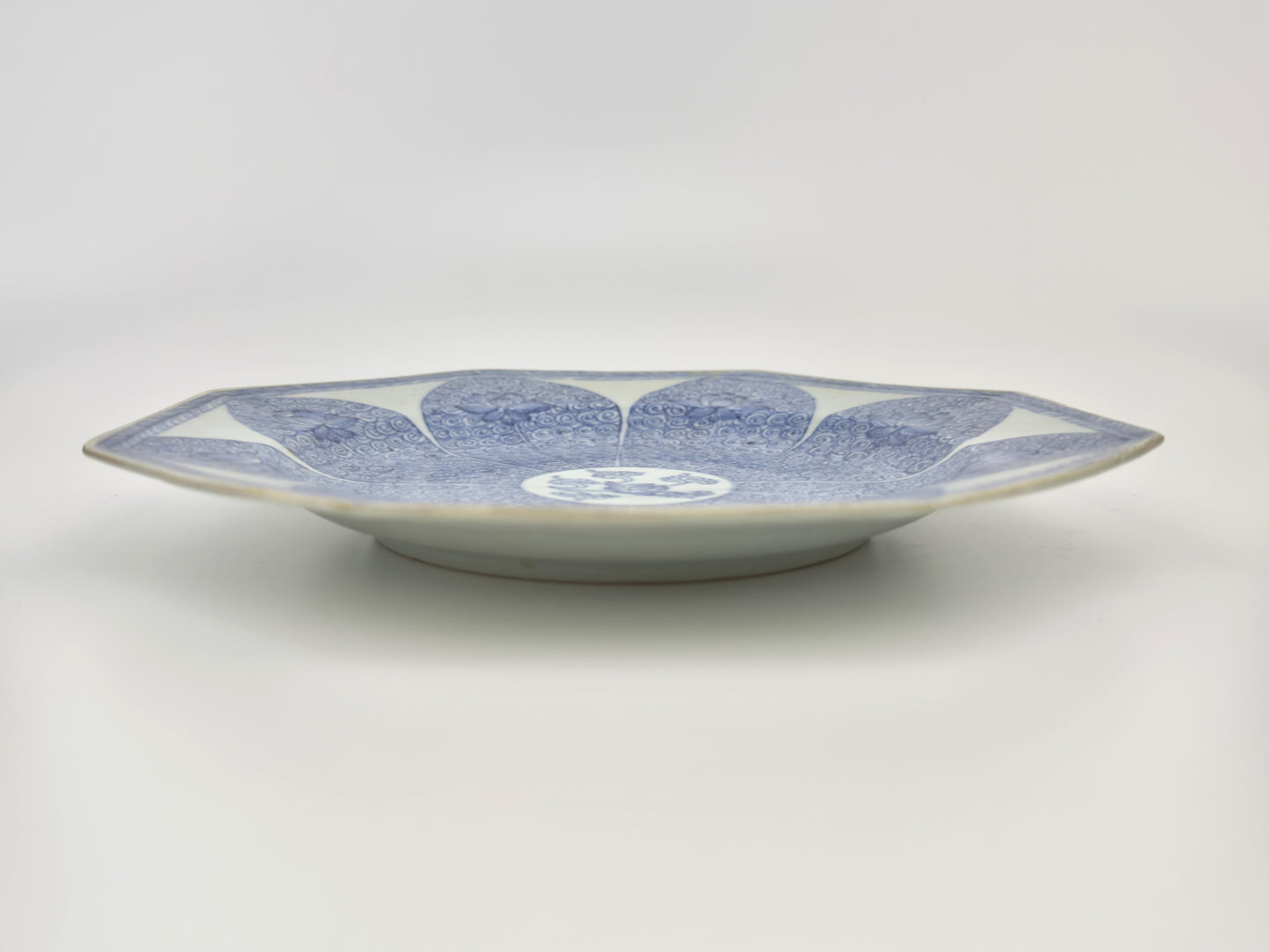 A BLUE AND WHITE LOTUS PATTERN DISH CIRCA 1725, QING DYNASTY, YONGZHENG REIGN (Ca Mau Ship)