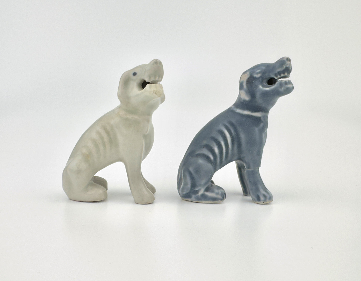 TWO FIGURINE OF SEATED HOUNDS, CIRCA 1725, QING DYNASTY, YONGZHENG REIGN