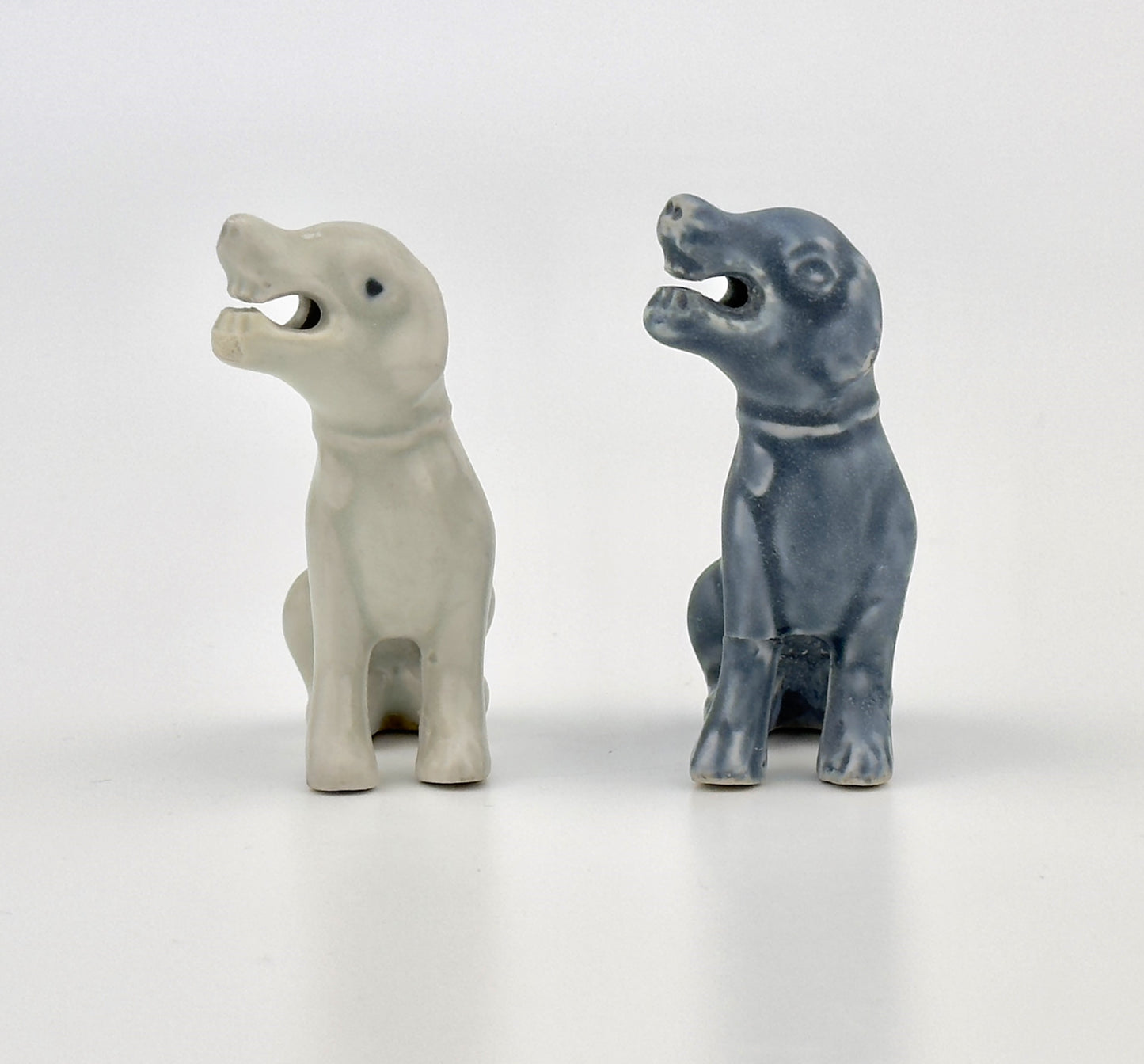 TWO FIGURINE OF SEATED HOUNDS, CIRCA 1725, QING DYNASTY, YONGZHENG REIGN