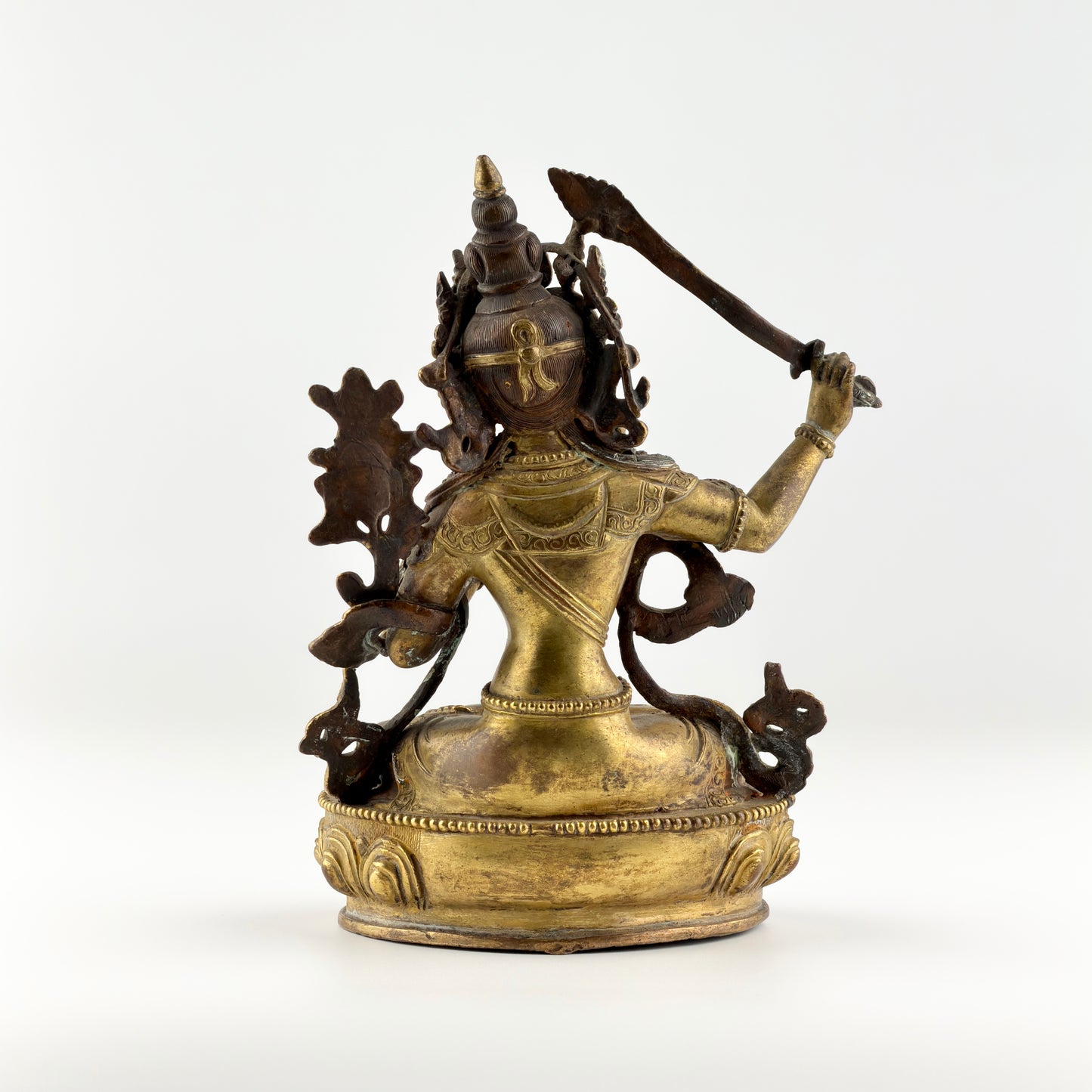 Gilt Bronze Figure of Manjusri Seated on a Lotus Base