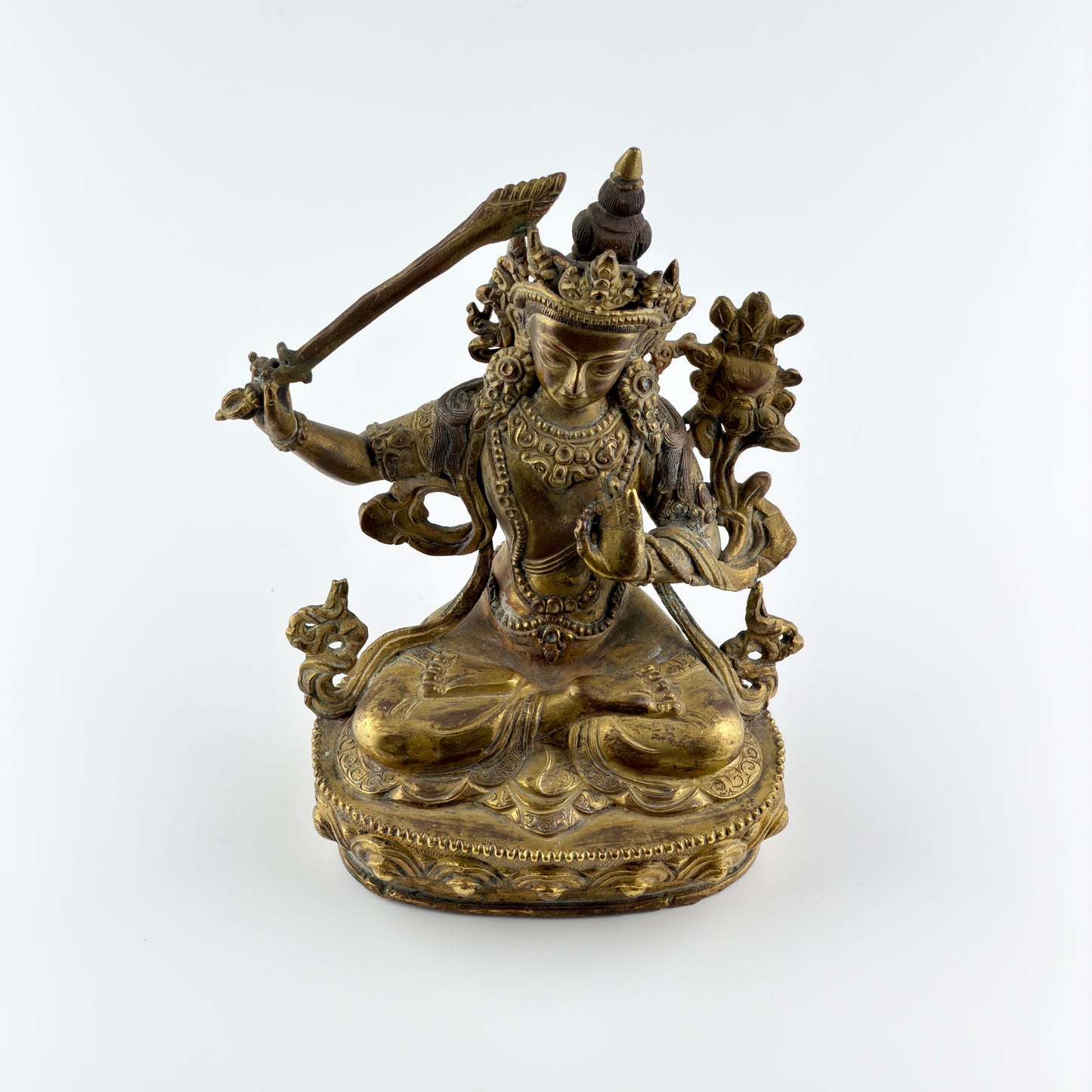 Gilt Bronze Figure of Manjusri Seated on a Lotus Base
