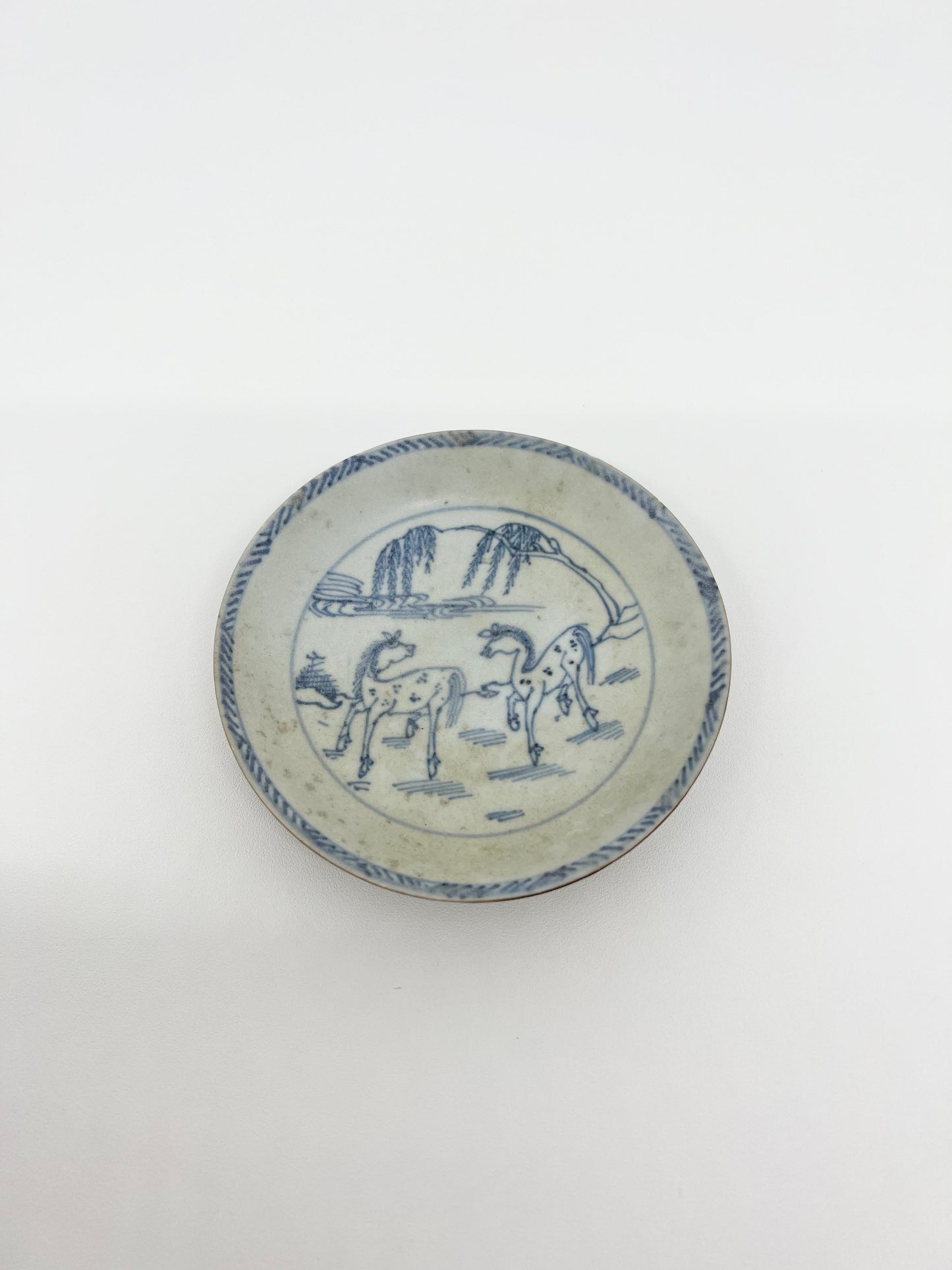 SPOTTED HORSES PATTERN SAUCER CIRCA 1725, QING DYNASTY, YONGZHENG REIGN