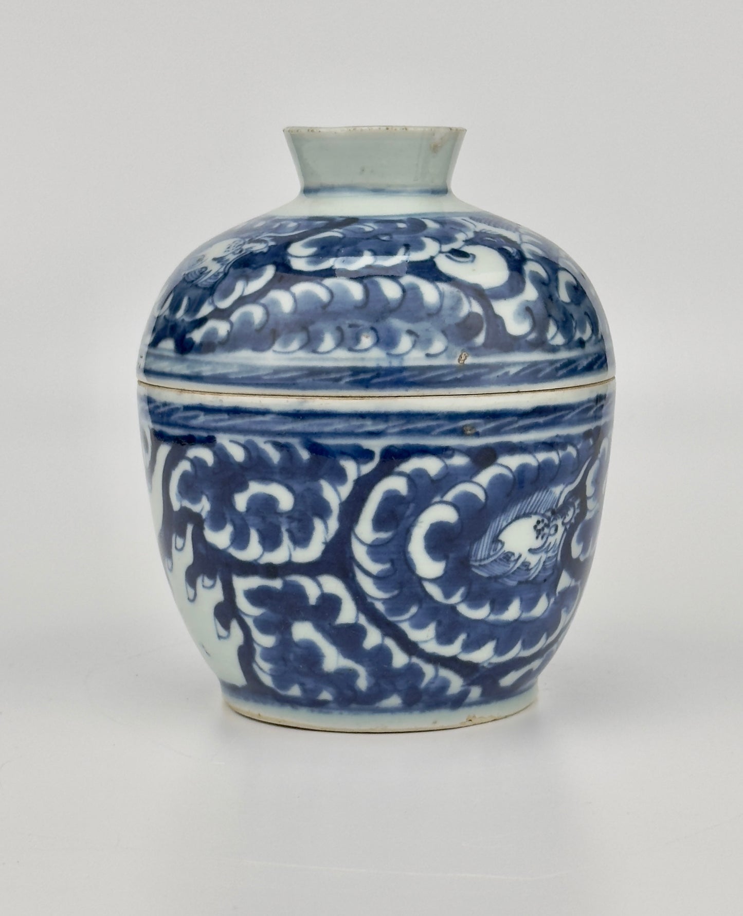 Blue and white Porcelain Covered Jar with Dragons amidst Clouds, Qing Period