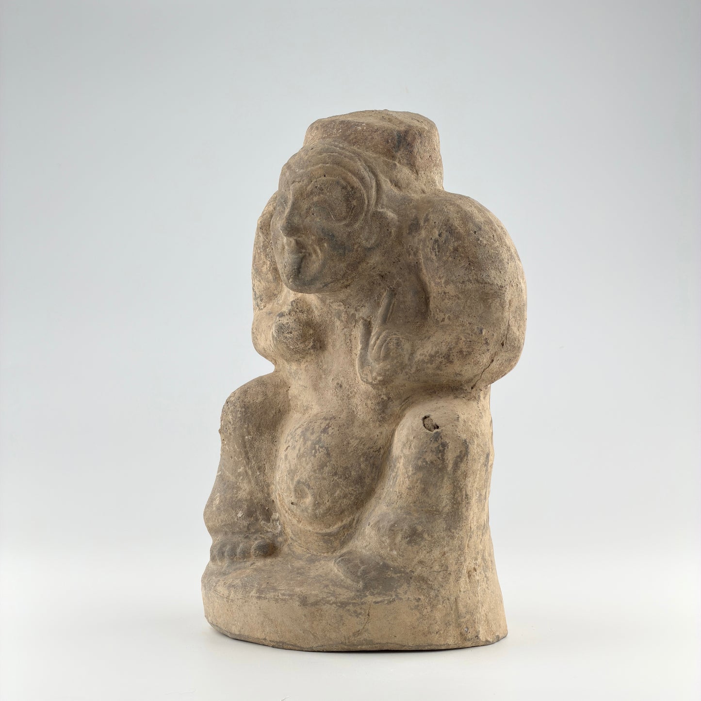 Pottery Figure of a Seated Drummer