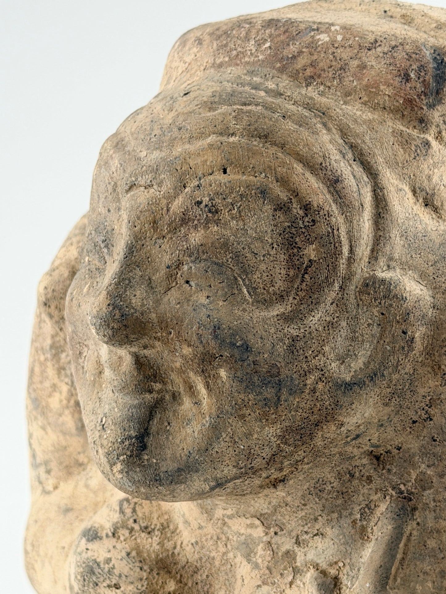 Pottery Figure of a Seated Drummer