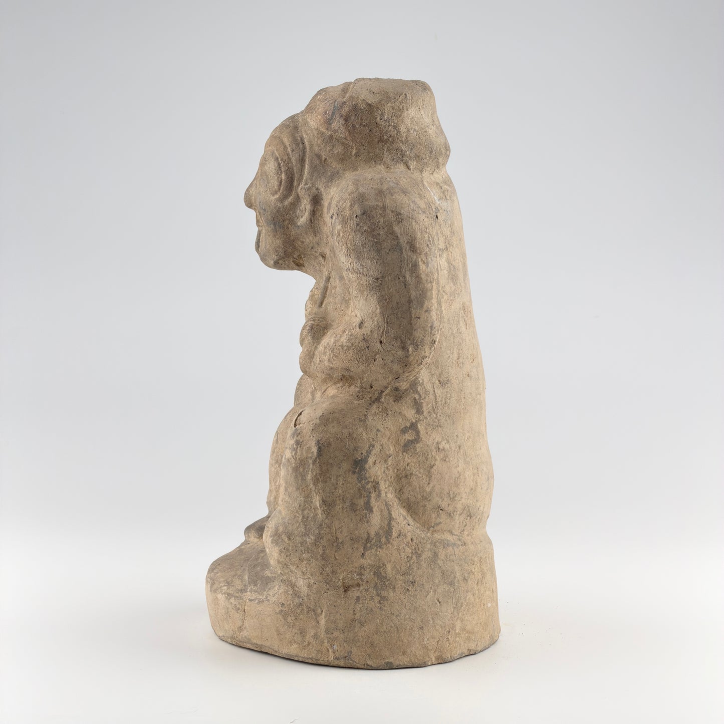 Pottery Figure of a Seated Drummer