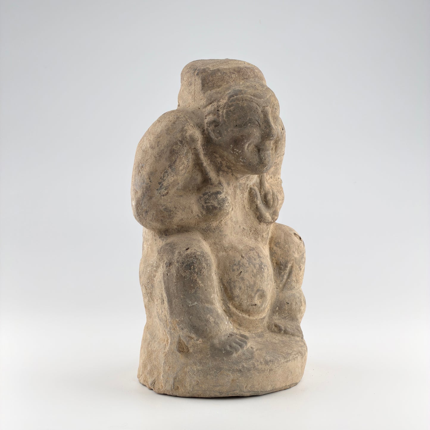 Pottery Figure of a Seated Drummer