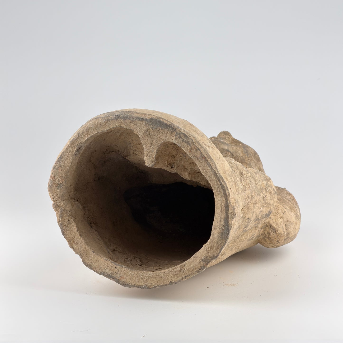 Pottery Figure of a Seated Drummer