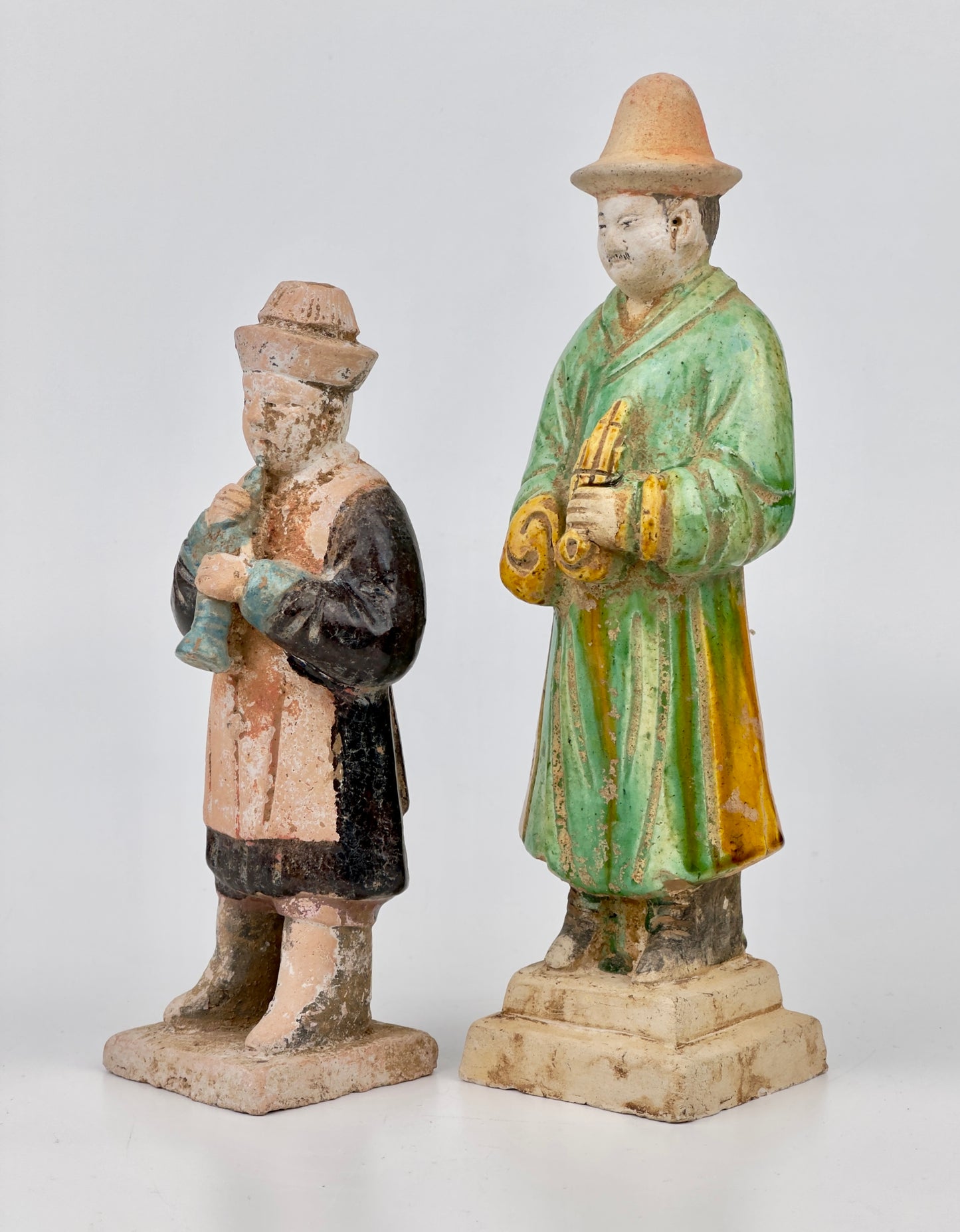 Two glazed figures playing the instrument, Ming Period (1368-1644)