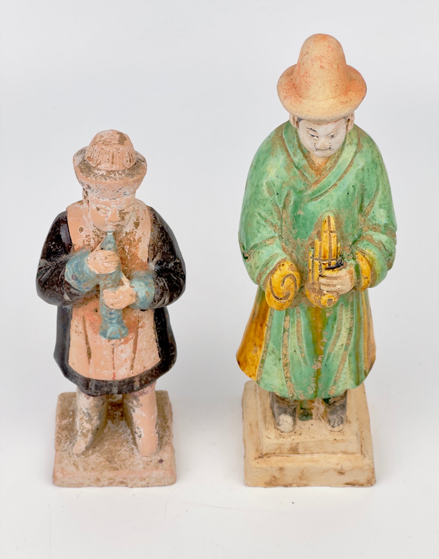 Two glazed figures playing the instrument, Ming Period (1368-1644)