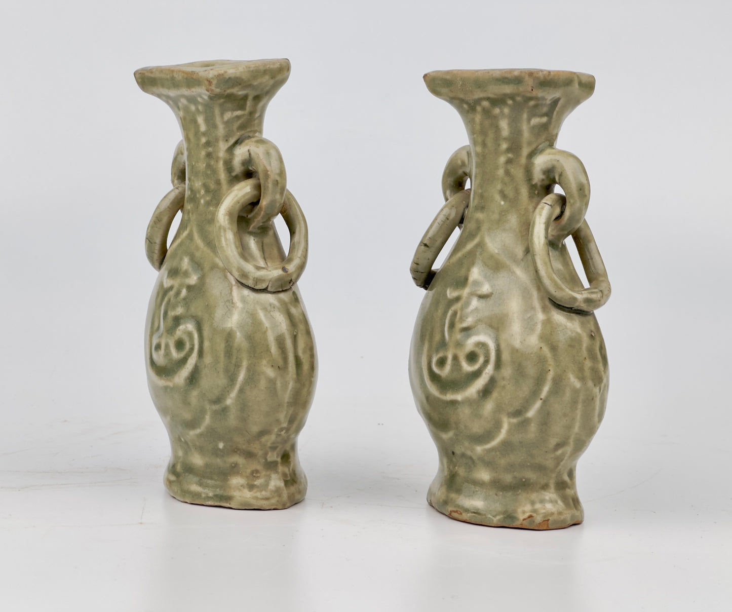 TWO MOLDED LONGQUAN CELADON 'FU SHOU' VASES, MING DYNASTY