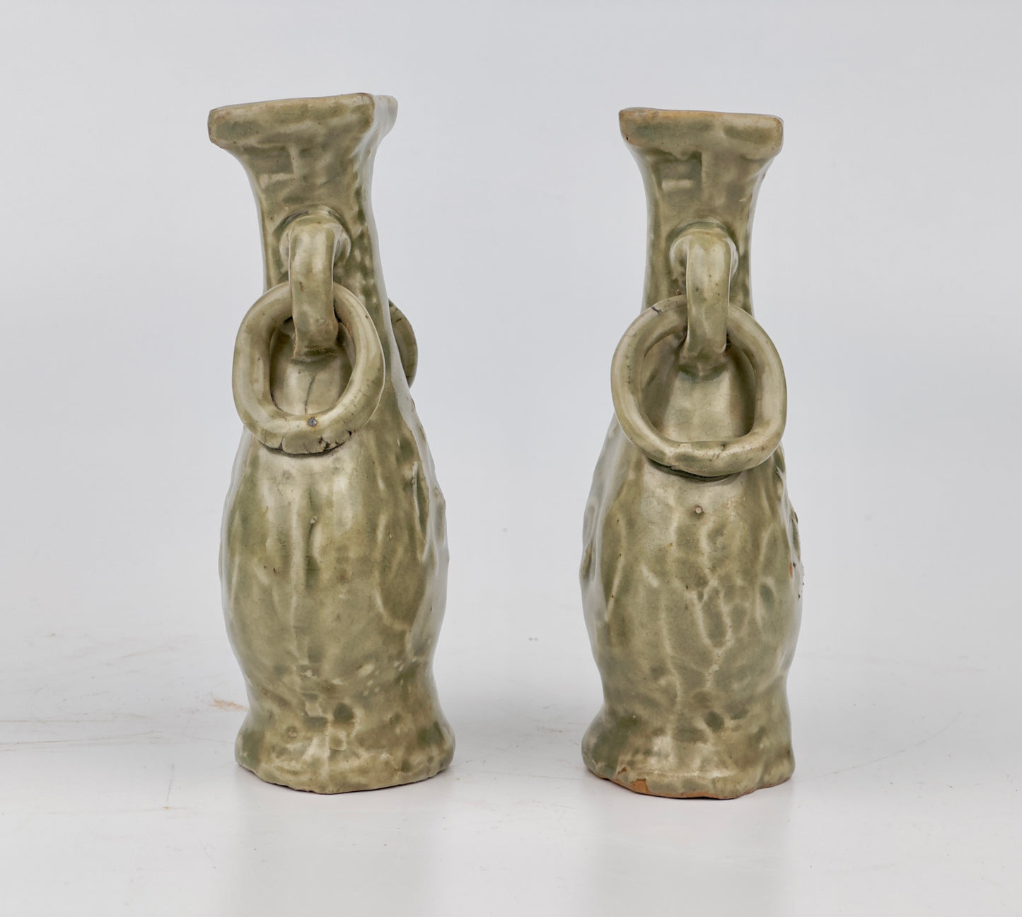 TWO MOLDED LONGQUAN CELADON 'FU SHOU' VASES, MING DYNASTY