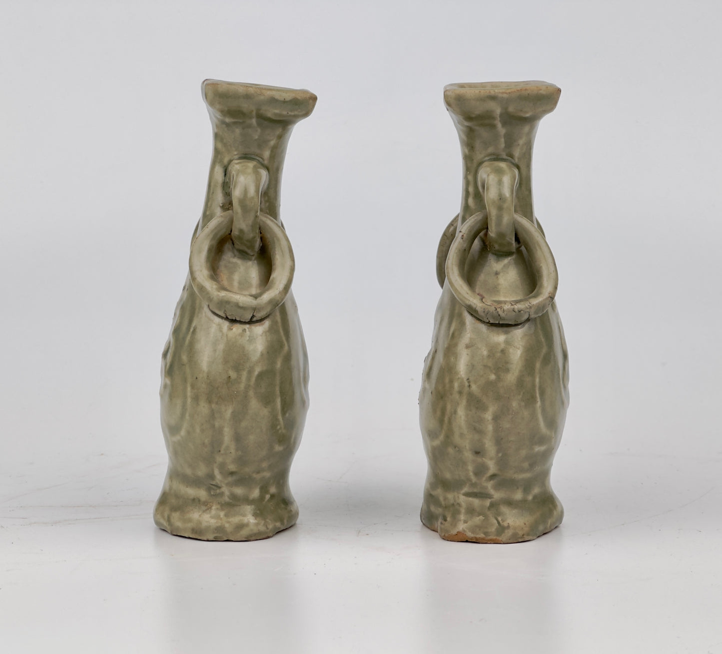 TWO MOLDED LONGQUAN CELADON 'FU SHOU' VASES, MING DYNASTY