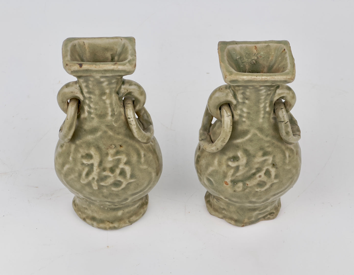 TWO MOLDED LONGQUAN CELADON 'FU SHOU' VASES, MING DYNASTY