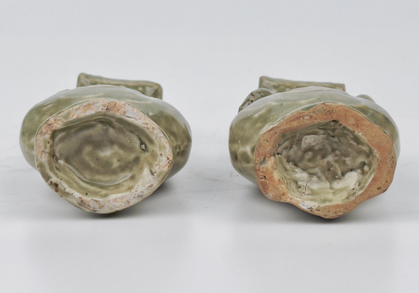 TWO MOLDED LONGQUAN CELADON 'FU SHOU' VASES, MING DYNASTY